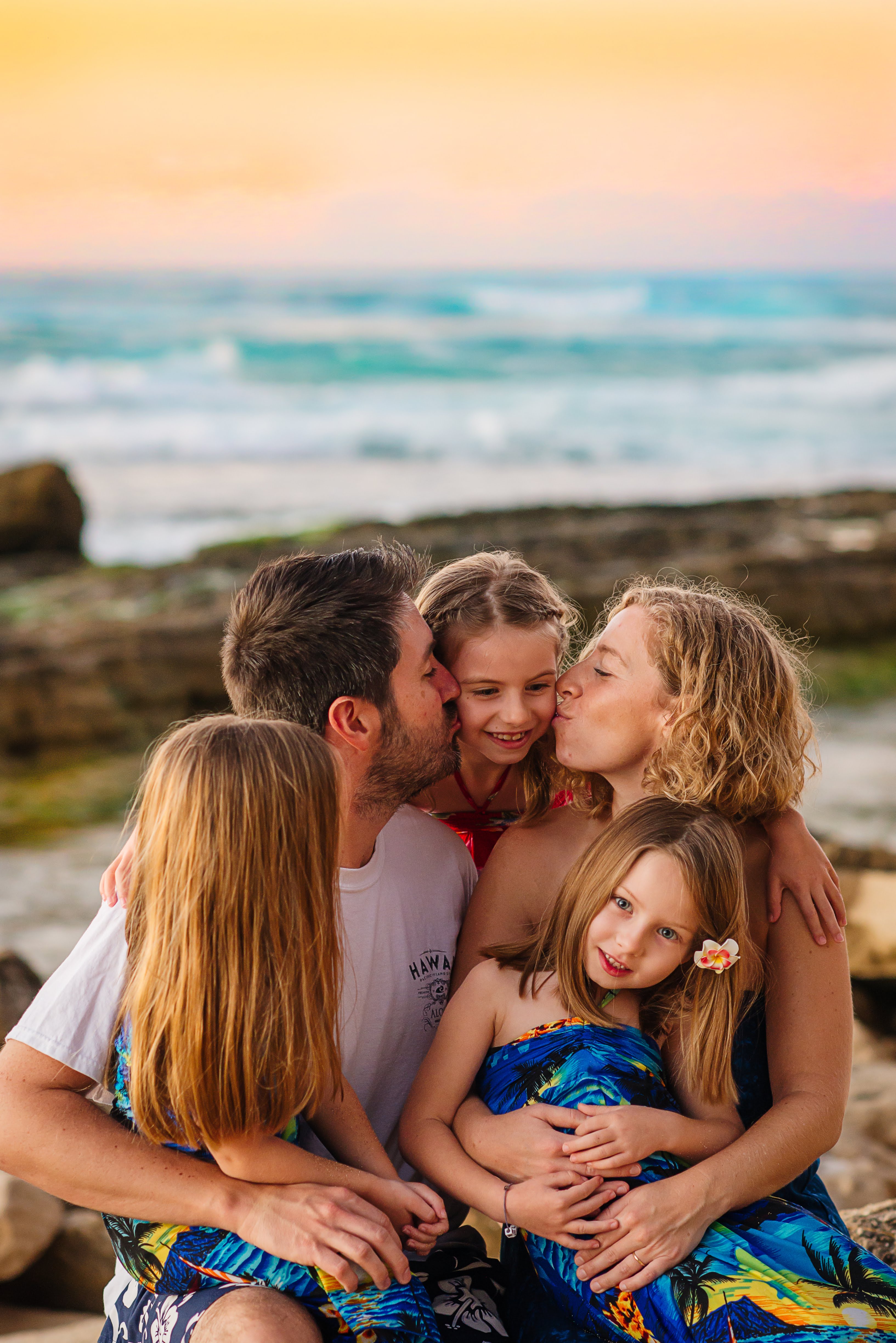 Family on a Hawaii beach www.thethreeyearexperiment.com