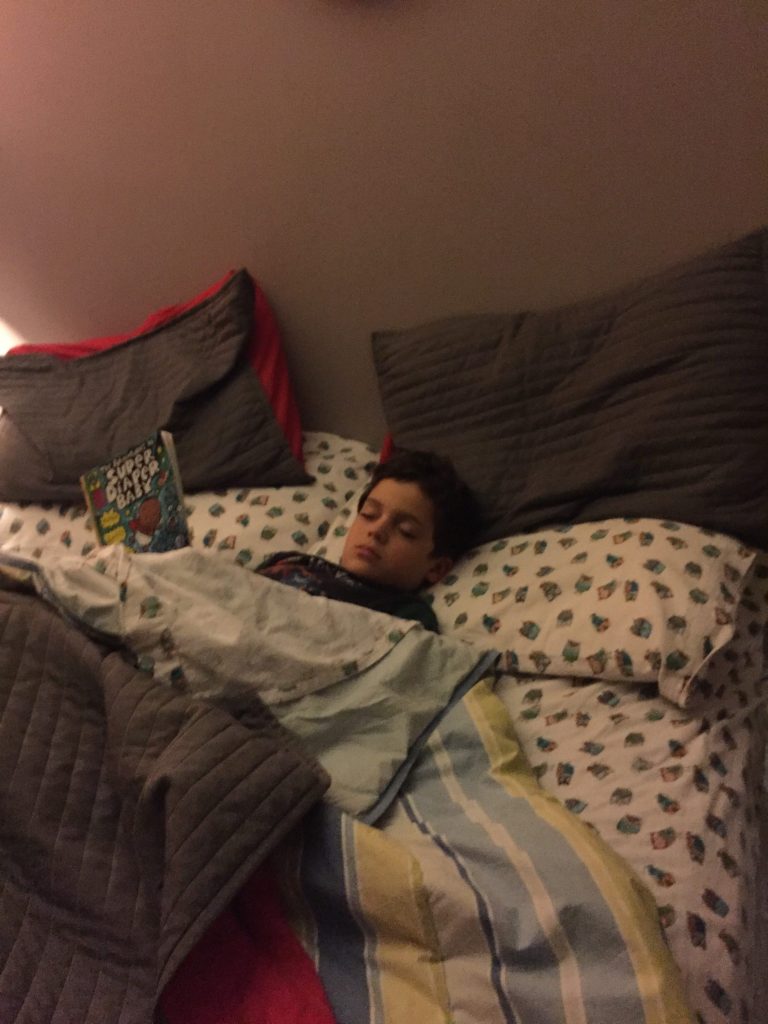 child in bed A Year of Good Money: Stop Eating Out www.thethreeyearexperiment.com
