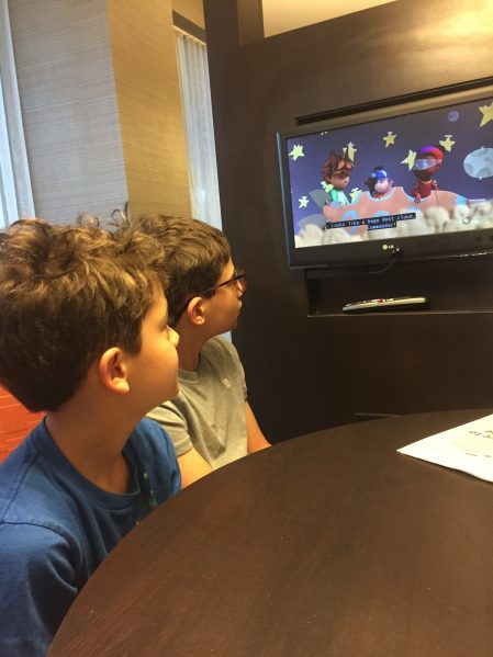 watching tv How to Communicate with Your Kids Without Using Cell Phones